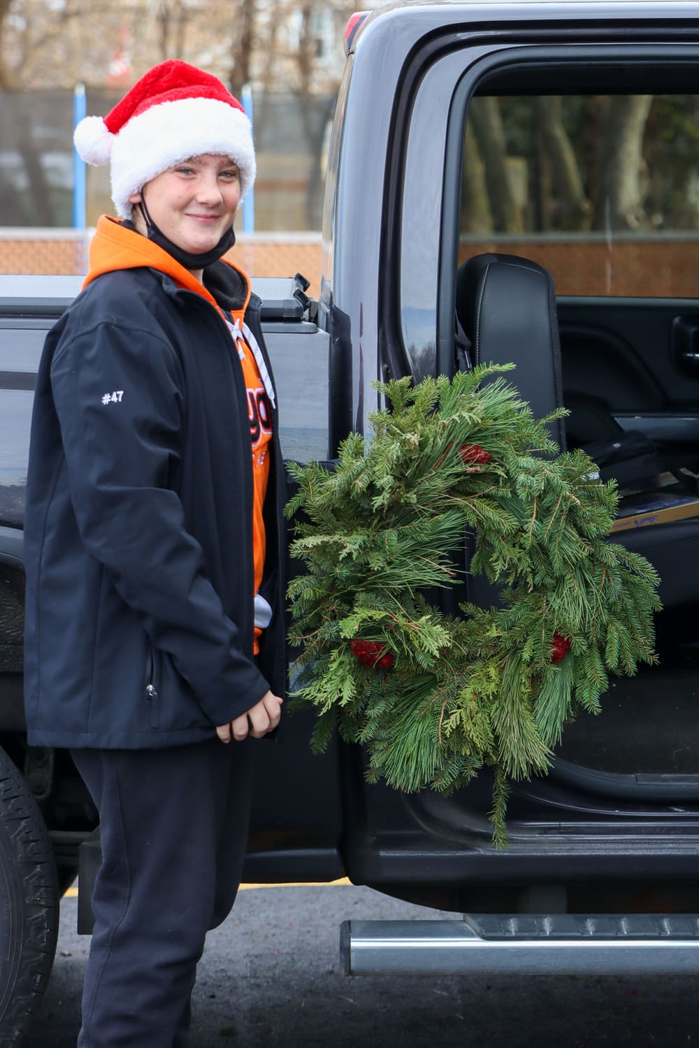 Volunteer Nolan brings holiday cheer to the fundraiser